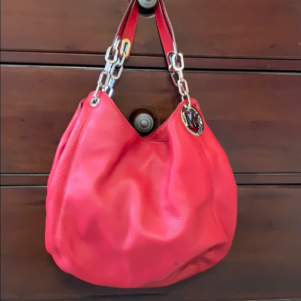 A beautiful red Michael Kors bag